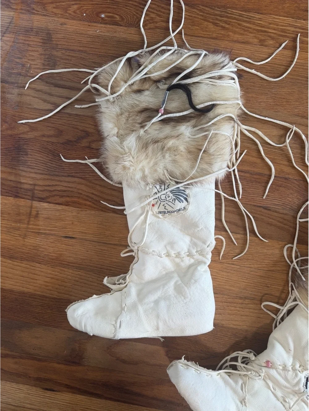 Handcrafted White Leather and Fur Moccasin Boots with Beaded Design